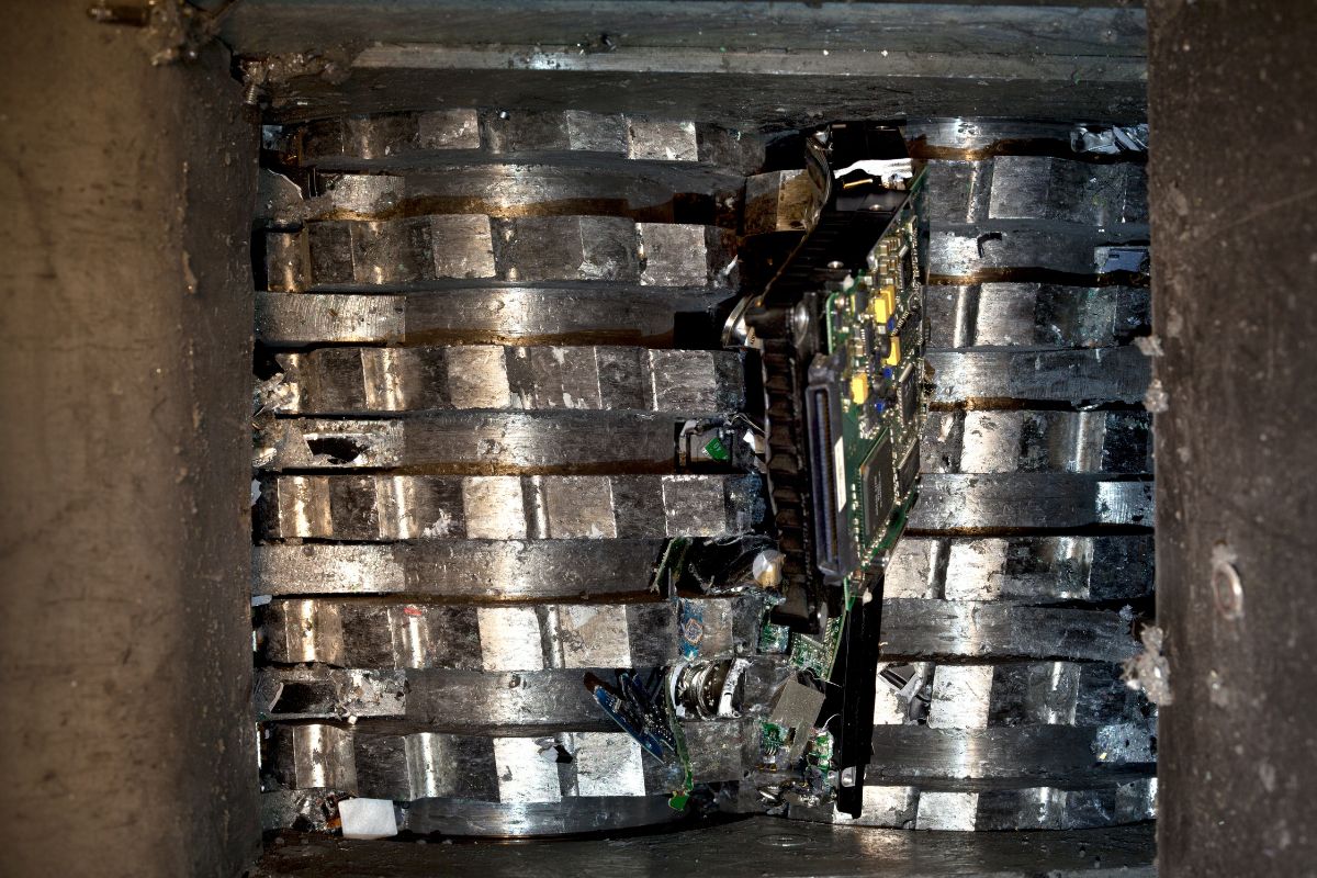 Crushed e-waste after secure destruction